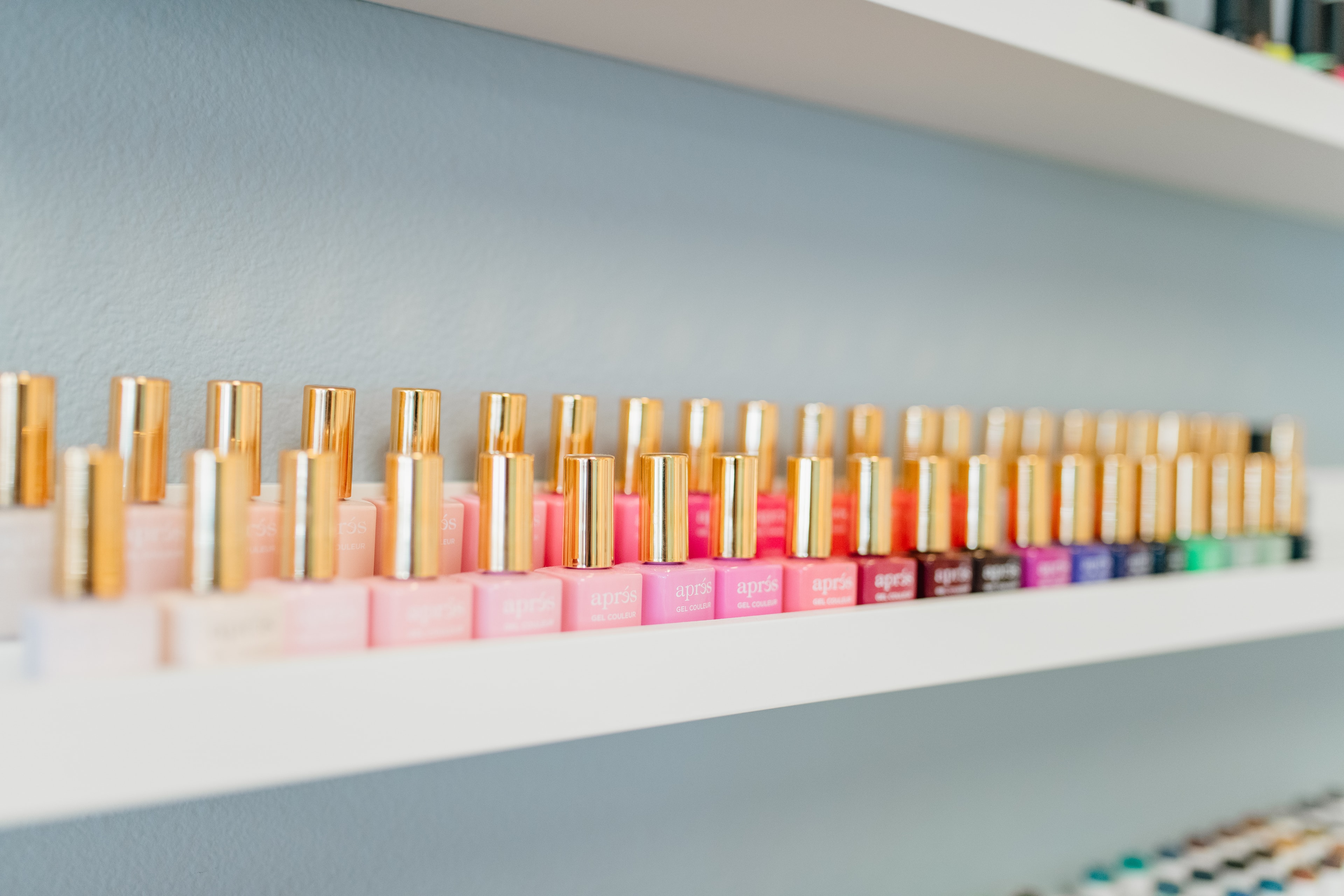 Aprés gel color bottles on shelf at Heather's Nail Boutique